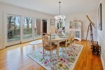 Gorgeous formal dining room with access to the large back deck